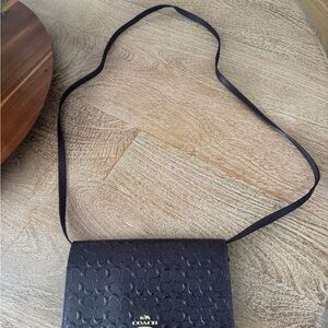 Coach  Small Crossbody Bag with Minimalist Design